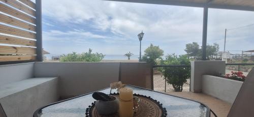 Paralia Dionysiou Apartment | Μοναδικές στιγμές χαλάρωσης με θέα την θάλασσα!