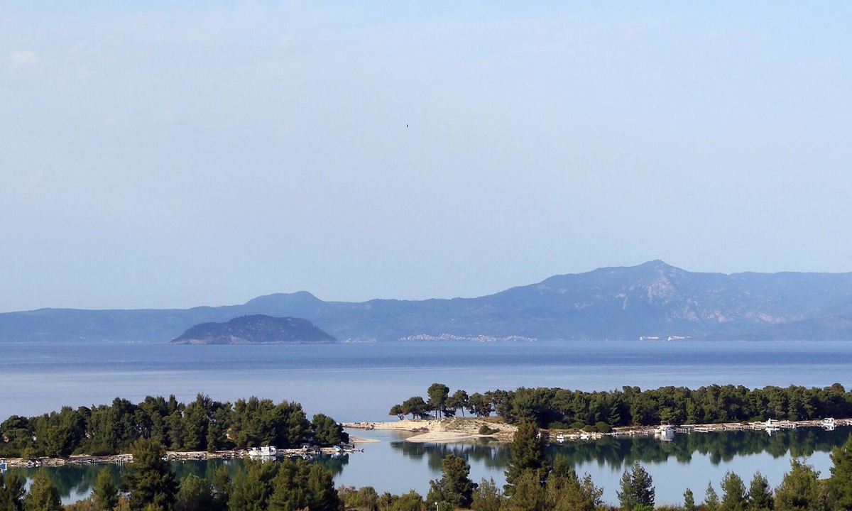Pefkochori Villa | Pefkochori villa with a stunning panoramic view and a waterfall private pool.