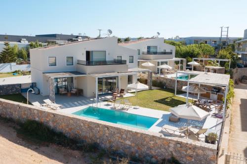 Kavros House | Pelagia's Loft Villas Haroupi & Rodi with Private Heated Pools, 5 Walking Distance to the Beach