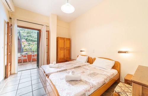 Lakones Apartment | Apartment 'Arianna 14' with Private Terrace, Shared Pool and Wi-Fi