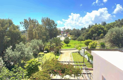 Kalithies Apartment | Bougainvillea Retreat above Faliraki-Stunning views from terraces,private garden
