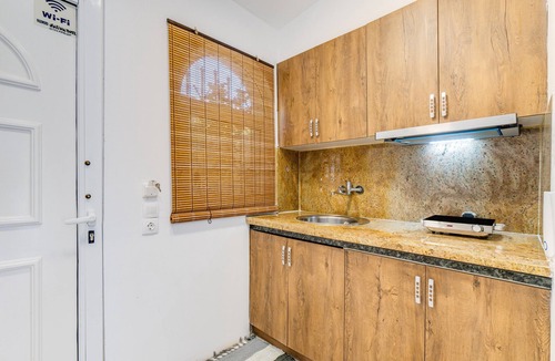 Agios Gordios Apartment | Doliva Anthi Apartment with Private Hot Tub, Mountain View, Wi-Fi, and Air Conditioning