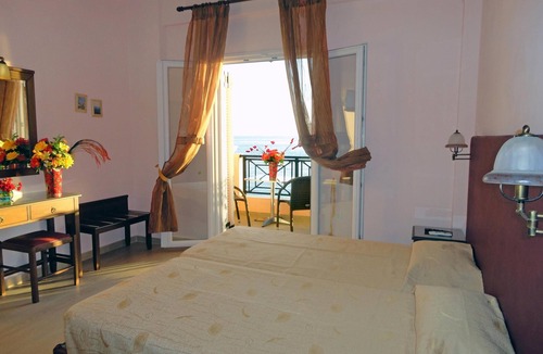 Benitses Apartment | Galini Sea Apartment 2 at the Beach with Wi-Fi, A/C & Garden