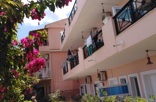 Benitses Apartment | Galini Sea Apartment 2 at the Beach with Wi-Fi, A/C & Garden