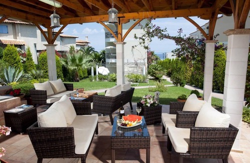 Polichrono Apartment | Holiday Apartment in Pallini with Private Terrace and Garden View