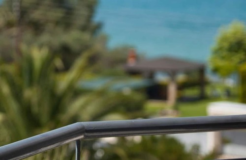 Polichrono Apartment | Holiday apartment on the second floor with a balcony and a sea view, amidst a wonderful park-like site