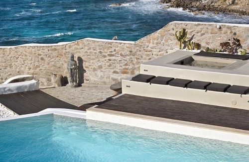 Agios Ioannis Villa | Luxurious Sunset Sea Front 5 Master bedroom villa with exterior hot tub.