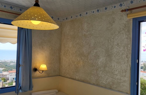 Piskopiano Apartment | Quadruple Room full view in blue apartment mountain view