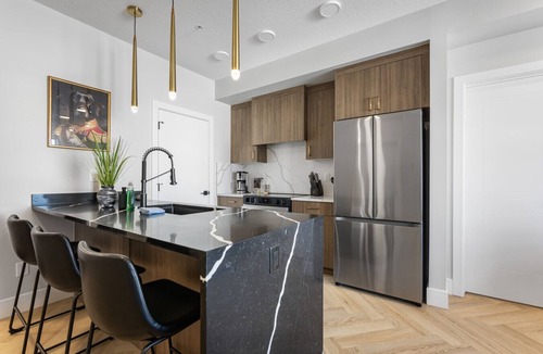 Currie Barracks Condo | Stylish Calgary Getaway Near 17th Ave