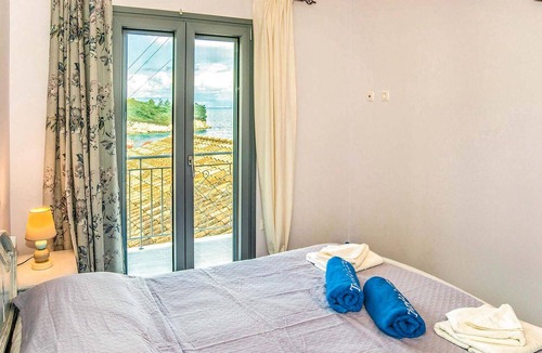 Longos Apartment | This recently renovated village house boasts magnificent views of the Ionian Sea.