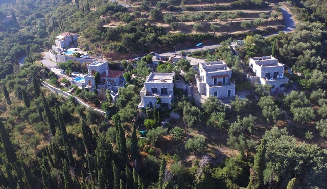 Greek 140 m2 stone house , 3 bedrooms, with beautiful sea and mountain views.