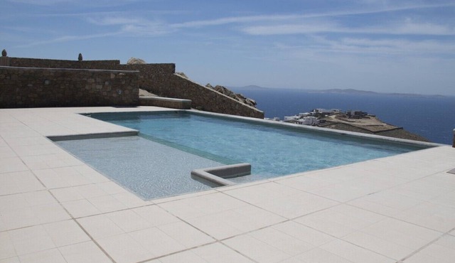 Mykonos Villa Coralba with swimming pool, helipad, sunset and sea view