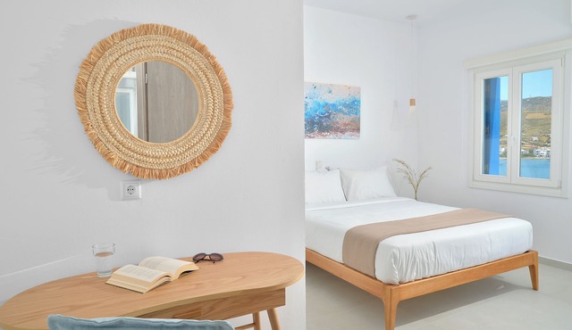 Sea-side Villa Hydroussa by Andros Homes, ideal for a relaxing retreat.