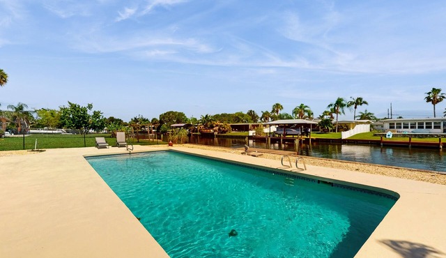 Spacious waterfront home with private pool, sunroom and dock. in Cocoa Beach