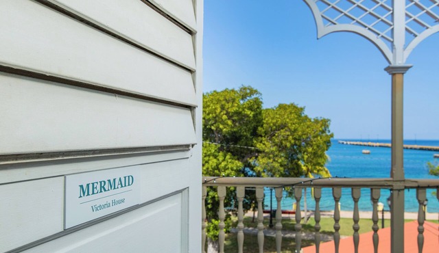 VERY Spacious 3rd floor unit with gorgeous ocean view and wrap around porch in Frederiksted