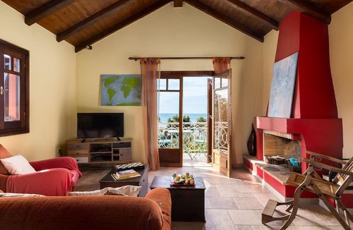 Agios Matthaios House | Idyllically situated and luxurious villa with a veranda and a gazebo