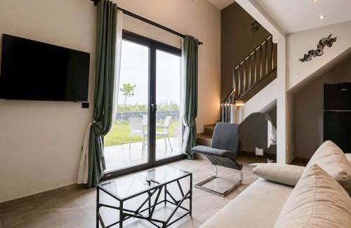 Thermaikos Apartment | Epanomi Suites - Modern Living with Garden Retreat